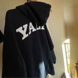 Champion navy zip up hoodie with Yale emblem from the Yale Bookstore.